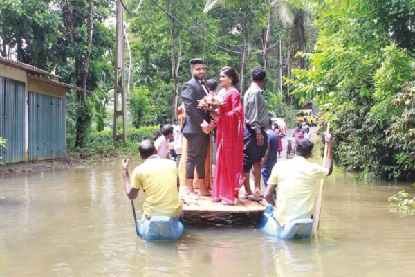 இலங்கையில் ஏற்பட்டுள்ள அனர்த்த நிலைமையால் புதுமண ஜோடிக்கு நிகழ்ந்த கதி